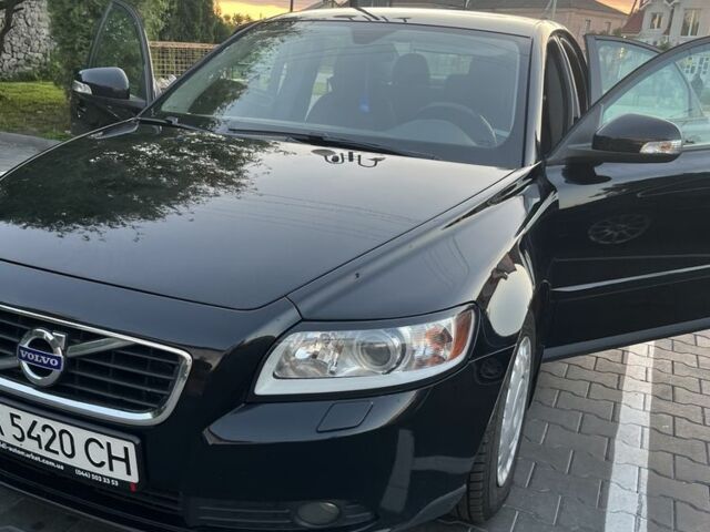 Чорний Вольво S40, об'ємом двигуна 2 л та пробігом 164 тис. км за 6801 $, фото 1 на Automoto.ua