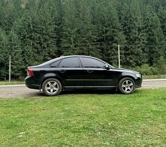 Чорний Вольво S40, об'ємом двигуна 2 л та пробігом 184 тис. км за 8015 $, фото 1 на Automoto.ua