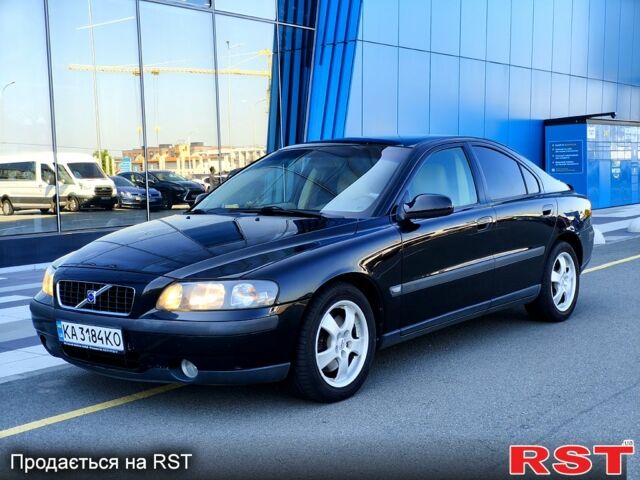 Черный Вольво С60, объемом двигателя 2.4 л и пробегом 303 тыс. км за 3900 $, фото 1 на Automoto.ua