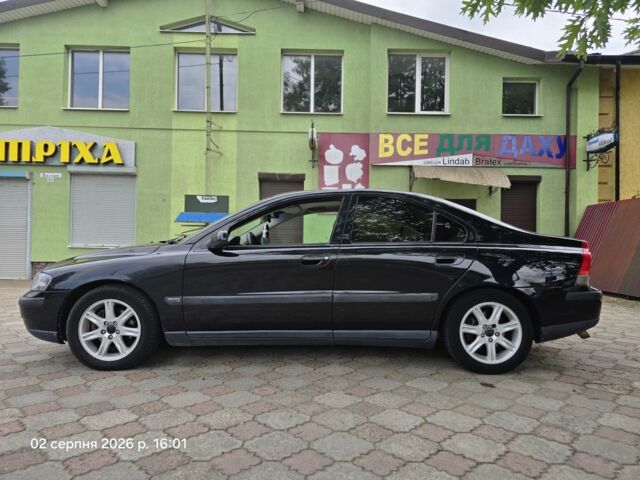 Черный Вольво С60, объемом двигателя 2.4 л и пробегом 270 тыс. км за 3984 $, фото 1 на Automoto.ua