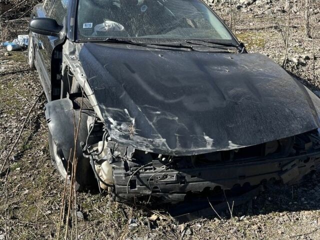 Черный Вольво С60, объемом двигателя 2.4 л и пробегом 150 тыс. км за 700 $, фото 1 на Automoto.ua