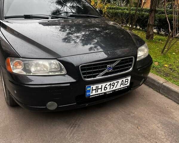 Черный Вольво С60, объемом двигателя 2.4 л и пробегом 245 тыс. км за 6499 $, фото 1 на Automoto.ua
