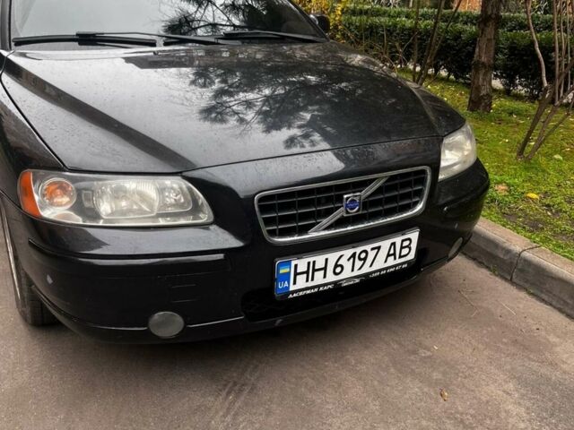 Черный Вольво С60, объемом двигателя 2.4 л и пробегом 245 тыс. км за 6399 $, фото 1 на Automoto.ua