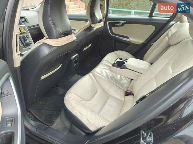 Черный Вольво С60, объемом двигателя 1.98 л и пробегом 220 тыс. км за 9500 $, фото 1 на Automoto.ua