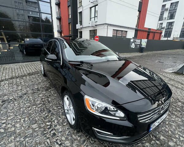 Черный Вольво С60, объемом двигателя 2.5 л и пробегом 155 тыс. км за 12599 $, фото 1 на Automoto.ua