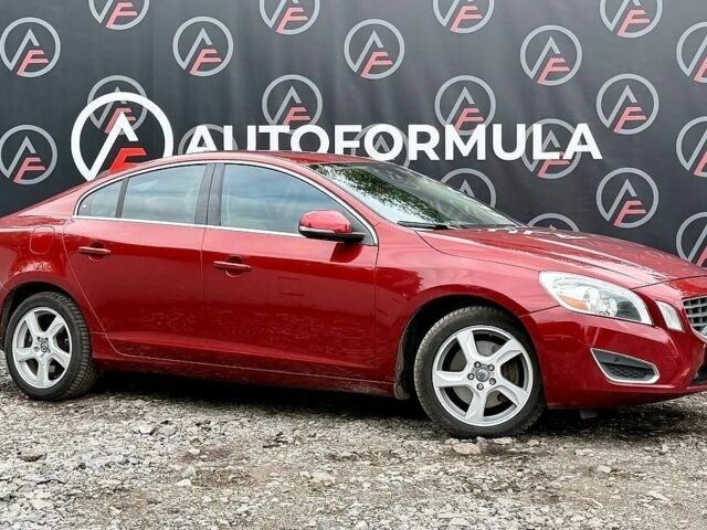 Червоний Вольво С60, об'ємом двигуна 2.5 л та пробігом 230 тис. км за 10990 $, фото 1 на Automoto.ua