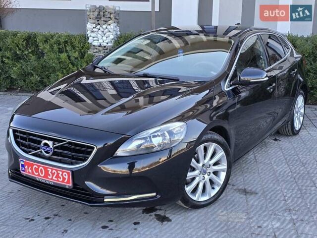 Чорний Вольво V40, об'ємом двигуна 1.56 л та пробігом 262 тис. км за 11199 $, фото 1 на Automoto.ua