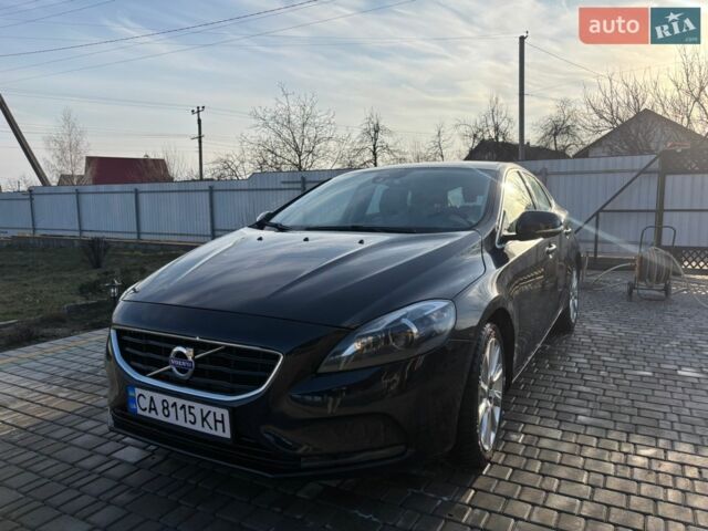 Чорний Вольво V40, об'ємом двигуна 1.6 л та пробігом 96 тис. км за 11999 $, фото 1 на Automoto.ua