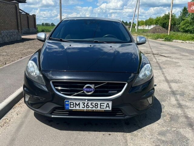 Чорний Вольво V40, об'ємом двигуна 1.56 л та пробігом 331 тис. км за 11000 $, фото 1 на Automoto.ua