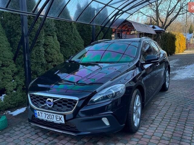 Чорний Вольво V40, об'ємом двигуна 1.98 л та пробігом 210 тис. км за 13000 $, фото 1 на Automoto.ua