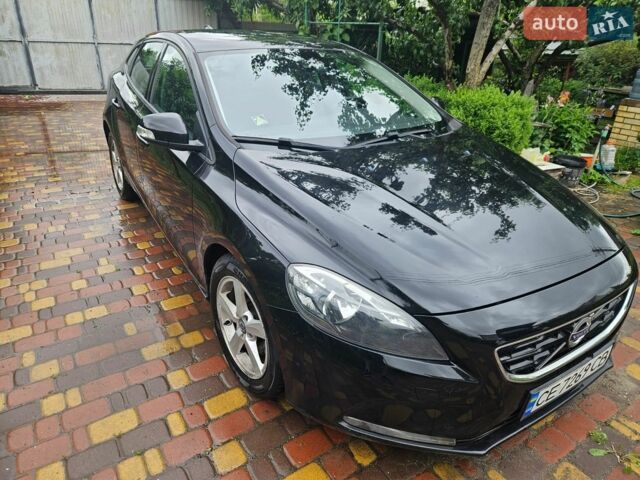 Чорний Вольво V40, об'ємом двигуна 2 л та пробігом 210 тис. км за 10500 $, фото 1 на Automoto.ua