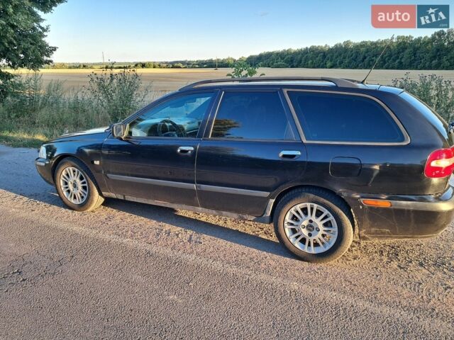 Чорний Вольво V40, об'ємом двигуна 1.87 л та пробігом 384 тис. км за 3300 $, фото 1 на Automoto.ua