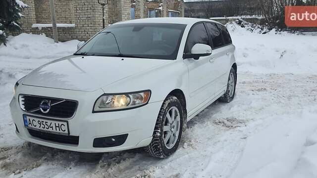Білий Вольво V50, об'ємом двигуна 1.56 л та пробігом 290 тис. км за 6800 $, фото 1 на Automoto.ua