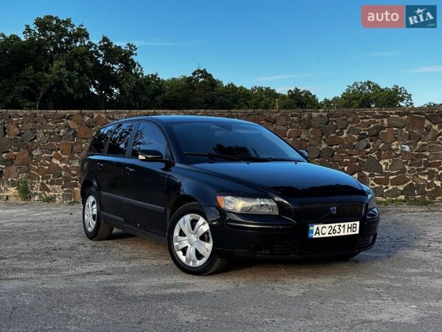 Чорний Вольво V50, об'ємом двигуна 2 л та пробігом 250 тис. км за 4099 $, фото 1 на Automoto.ua