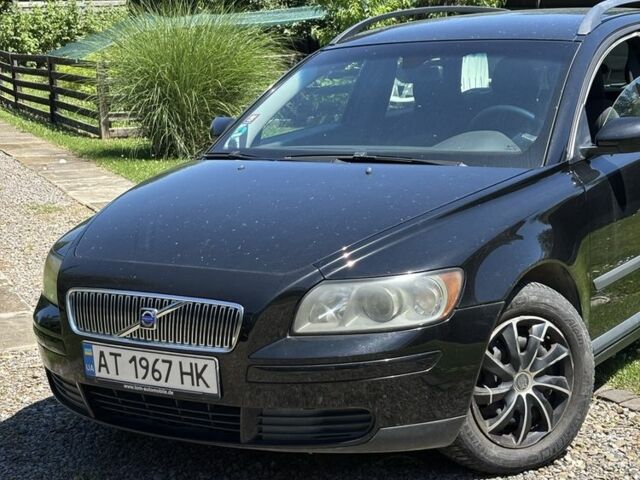 Черный Вольво В50, объемом двигателя 1.8 л и пробегом 193 тыс. км за 4100 $, фото 1 на Automoto.ua
