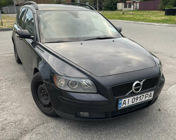 Черный Вольво В50, объемом двигателя 1.6 л и пробегом 394 тыс. км за 5500 $, фото 1 на Automoto.ua