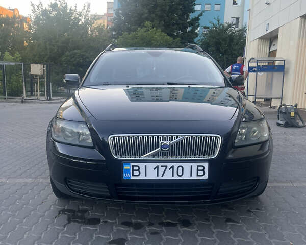 Черный Вольво В50, объемом двигателя 1.56 л и пробегом 314 тыс. км за 5600 $, фото 1 на Automoto.ua
