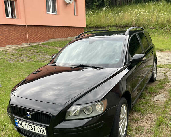 Черный Вольво В50, объемом двигателя 1.6 л и пробегом 339 тыс. км за 5400 $, фото 1 на Automoto.ua