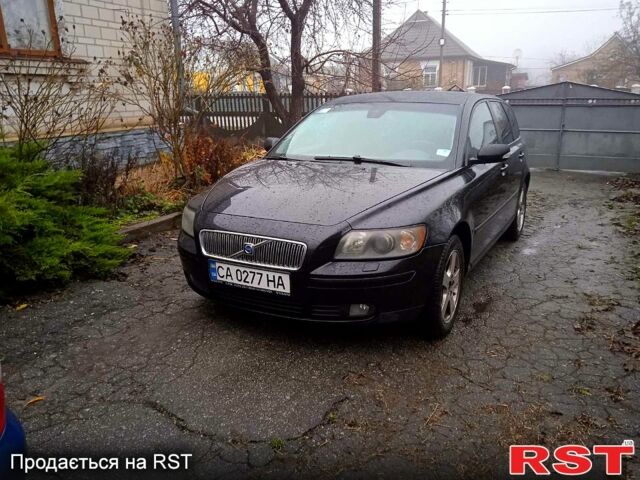 Черный Вольво В50, объемом двигателя 1.6 л и пробегом 250 тыс. км за 6000 $, фото 1 на Automoto.ua