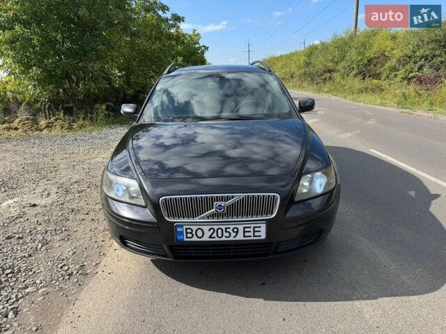 Черный Вольво В50, объемом двигателя 1.6 л и пробегом 348 тыс. км за 5300 $, фото 1 на Automoto.ua