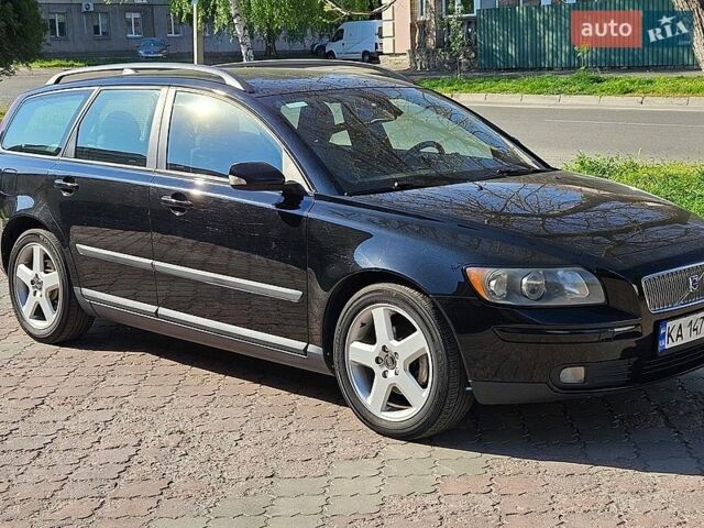 Черный Вольво В50, объемом двигателя 1.56 л и пробегом 215 тыс. км за 5100 $, фото 1 на Automoto.ua