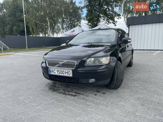 Черный Вольво В50, объемом двигателя 1.8 л и пробегом 347 тыс. км за 5500 $, фото 1 на Automoto.ua