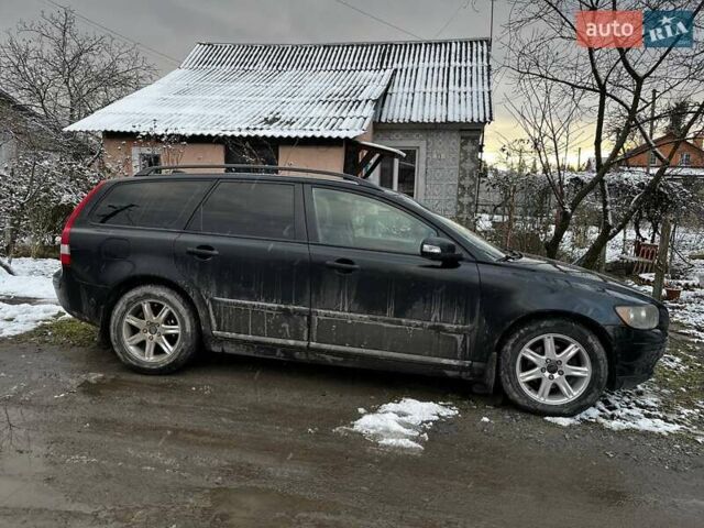 Черный Вольво В50, объемом двигателя 1.6 л и пробегом 284 тыс. км за 4700 $, фото 1 на Automoto.ua