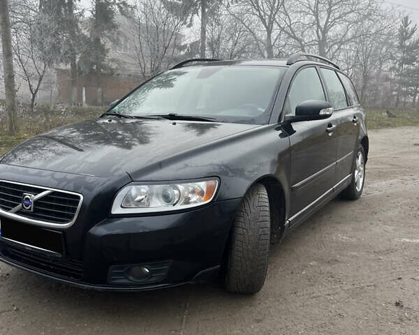 Черный Вольво В50, объемом двигателя 2 л и пробегом 252 тыс. км за 5700 $, фото 1 на Automoto.ua