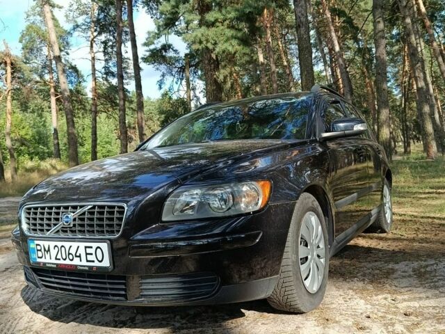 Черный Вольво В50, объемом двигателя 1.8 л и пробегом 218 тыс. км за 7000 $, фото 1 на Automoto.ua