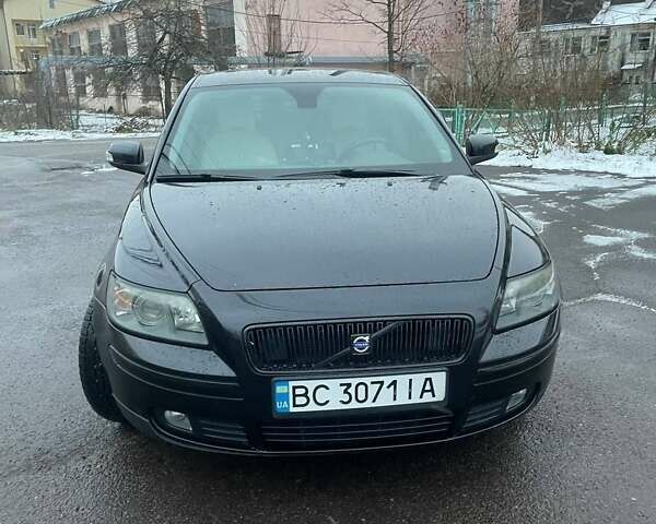 Черный Вольво В50, объемом двигателя 1.6 л и пробегом 293 тыс. км за 8300 $, фото 1 на Automoto.ua