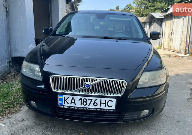 Чорний Вольво V50, об'ємом двигуна 2.4 л та пробігом 308 тис. км за 6100 $, фото 1 на Automoto.ua