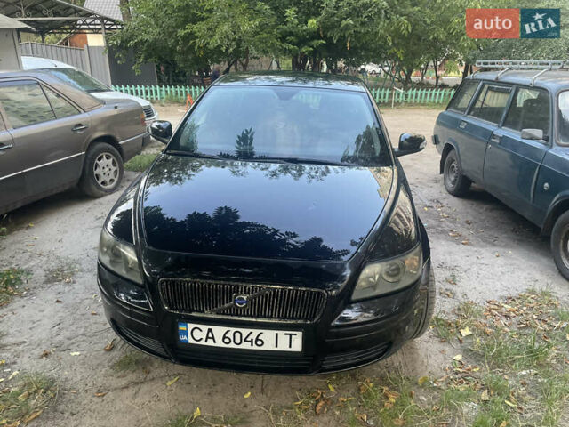 Чорний Вольво V50, об'ємом двигуна 1.56 л та пробігом 307 тис. км за 6500 $, фото 1 на Automoto.ua