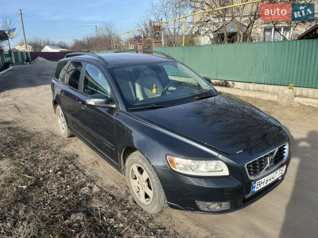 Чорний Вольво V50, об'ємом двигуна 1.56 л та пробігом 261 тис. км за 6700 $, фото 1 на Automoto.ua