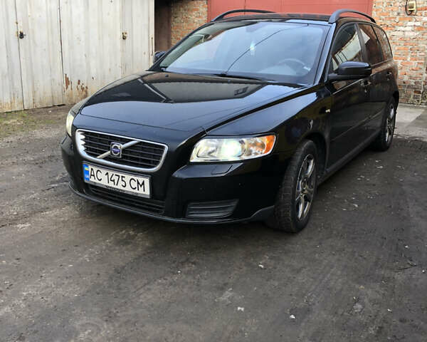 Черный Вольво В50, объемом двигателя 1.56 л и пробегом 310 тыс. км за 5150 $, фото 1 на Automoto.ua
