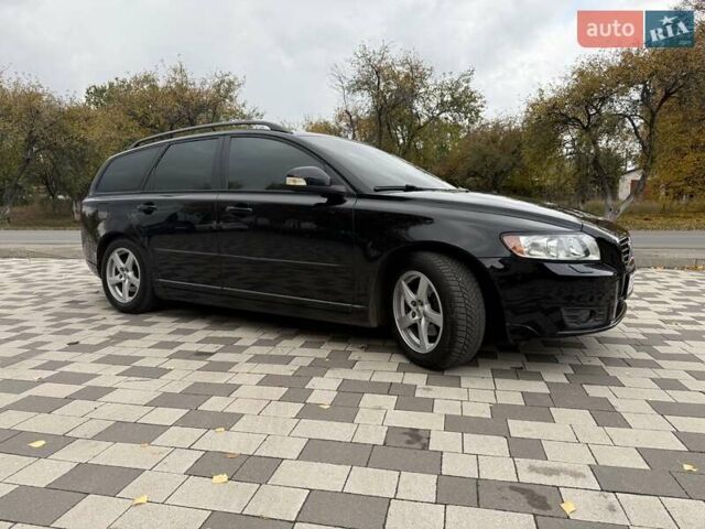 Черный Вольво В50, объемом двигателя 1.6 л и пробегом 111 тыс. км за 7200 $, фото 1 на Automoto.ua
