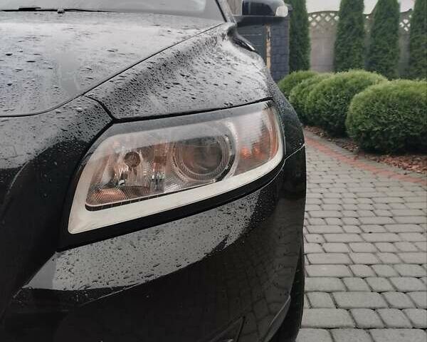 Черный Вольво В50, объемом двигателя 1.56 л и пробегом 235 тыс. км за 6750 $, фото 1 на Automoto.ua