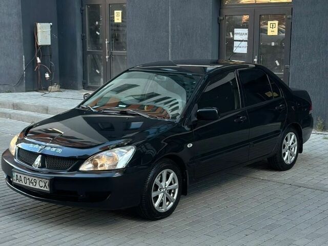 Черный Вольво В50, объемом двигателя 2 л и пробегом 290 тыс. км за 6999 $, фото 1 на Automoto.ua