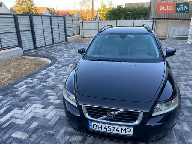Черный Вольво В50, объемом двигателя 1.6 л и пробегом 251 тыс. км за 6700 $, фото 1 на Automoto.ua