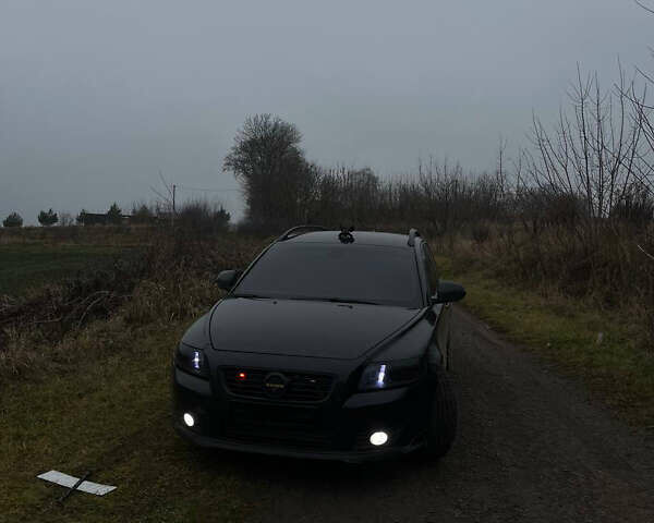 Черный Вольво В50, объемом двигателя 1.56 л и пробегом 292 тыс. км за 7300 $, фото 1 на Automoto.ua