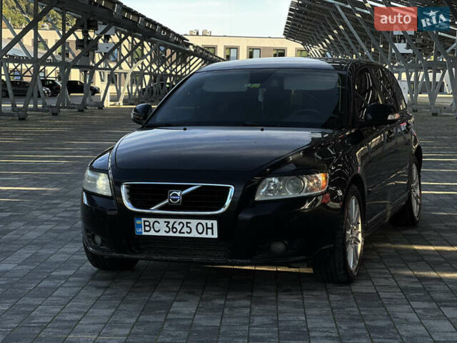 Чорний Вольво V50, об'ємом двигуна 1.56 л та пробігом 328 тис. км за 6450 $, фото 1 на Automoto.ua