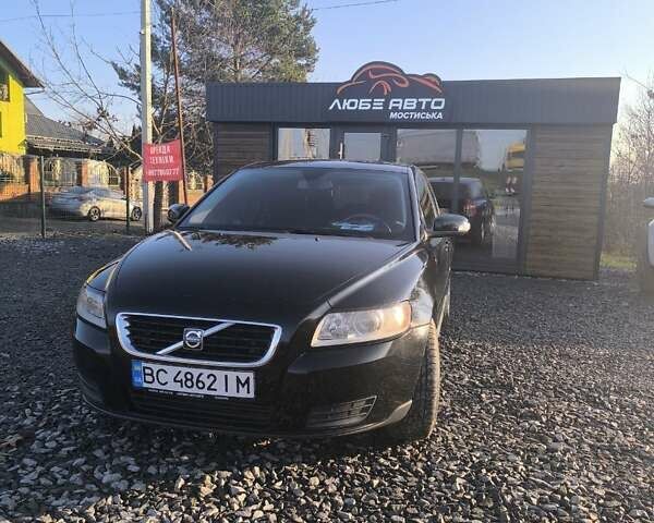 Черный Вольво В50, объемом двигателя 1.56 л и пробегом 235 тыс. км за 6499 $, фото 1 на Automoto.ua