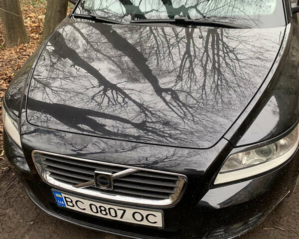 Черный Вольво В50, объемом двигателя 2 л и пробегом 245 тыс. км за 8300 $, фото 1 на Automoto.ua
