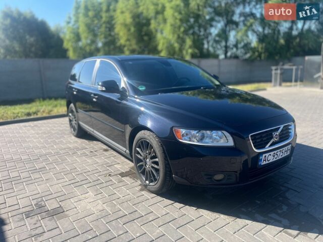 Чорний Вольво V50, об'ємом двигуна 1.56 л та пробігом 252 тис. км за 6999 $, фото 1 на Automoto.ua