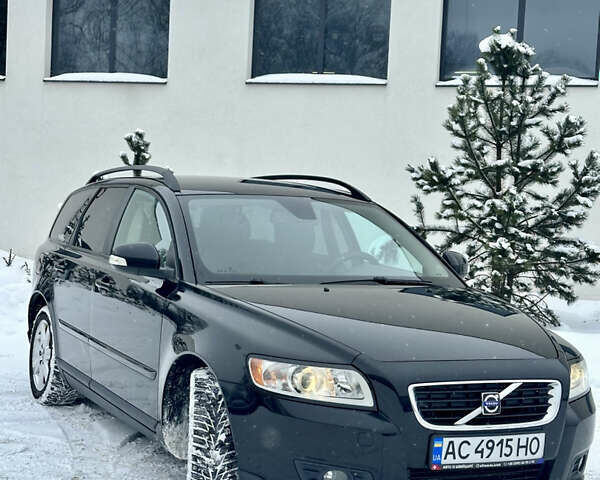 Чорний Вольво V50, об'ємом двигуна 1.56 л та пробігом 272 тис. км за 6999 $, фото 1 на Automoto.ua