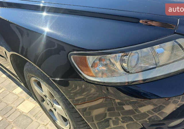 Черный Вольво В50, объемом двигателя 1.56 л и пробегом 237 тыс. км за 7000 $, фото 1 на Automoto.ua