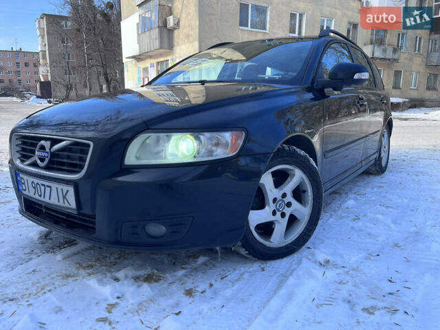 Черный Вольво В50, объемом двигателя 1.56 л и пробегом 288 тыс. км за 7500 $, фото 1 на Automoto.ua