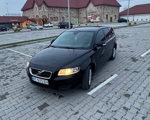 Черный Вольво В50, объемом двигателя 1.56 л и пробегом 285 тыс. км за 6599 $, фото 1 на Automoto.ua