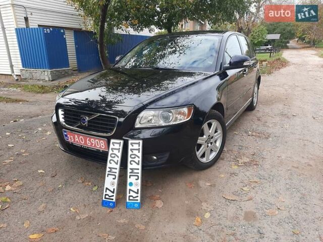 Чорний Вольво V50, об'ємом двигуна 1.6 л та пробігом 261 тис. км за 7770 $, фото 1 на Automoto.ua