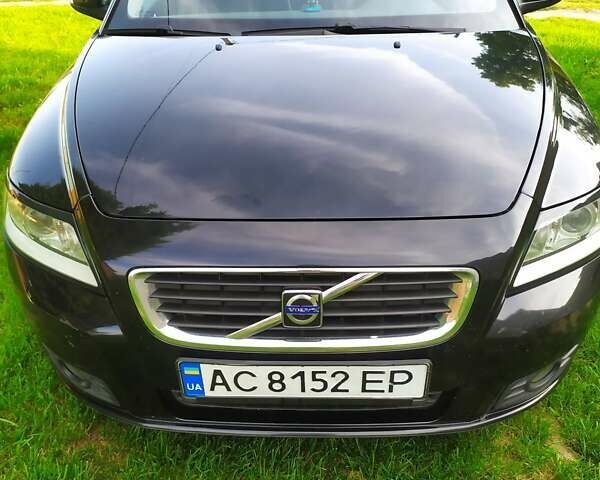 Черный Вольво В50, объемом двигателя 1.56 л и пробегом 265 тыс. км за 6900 $, фото 1 на Automoto.ua