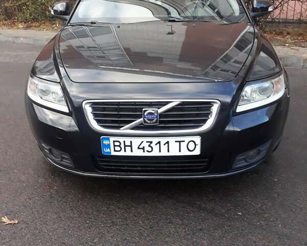 Чорний Вольво V50, об'ємом двигуна 1.56 л та пробігом 238 тис. км за 7700 $, фото 1 на Automoto.ua